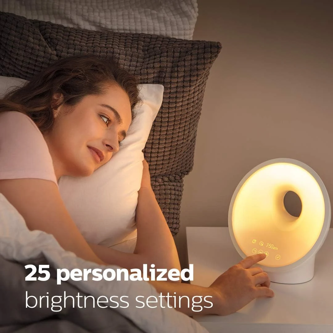 Exact Philips SmartSleep HF3650/60 showing its sunrise, sound, FM, and breathing features